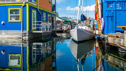 Fototapeta na wymiar Victoria, Vancouver Island British Columbia Canada. Boat Houses at Fisherman's Wharf.