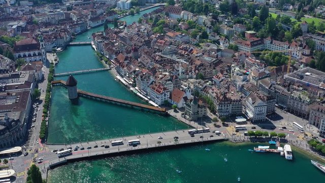 Aerial view of cityscape of Lucerne, historic centre of city, famous landmark Chapel Bridge (Kapellbr&uuml;cke) across river Reuss - landscape panorama of Switzerland from above, Europe