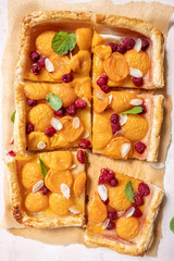 Summer puff pastry tart with apricots and raspberry