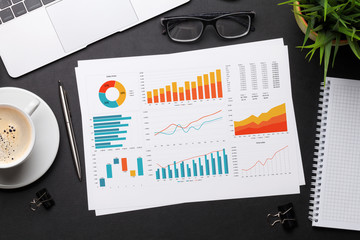 Office workplace table with reports
