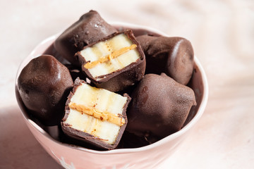 Frozen healthy dessert. Dark Chocolate Peanut Butter Banana Bites