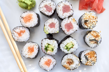 Sushi set. Set of different sushi with seafood. Sushi rolls with different fillings. A dish of traditional Japanese cuisine. Rolls with a variety of seafood. Rolls with oceanic fish and vegetables.