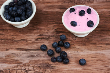Naklejka na ściany i meble Blueberry ice cream and natural yogurt.