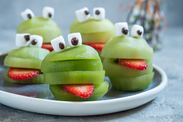 Spooky green kiwi monsters for Halloween party