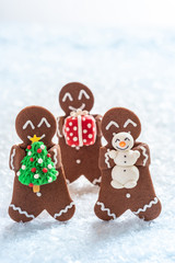 Funny Gingerbread cookie men with tiny marzipan snowman