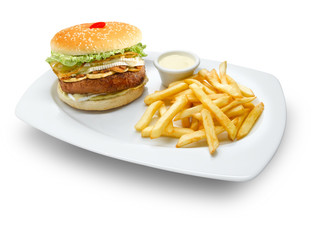  Deliciosa Hamburguesa con patatas y salsa. Delicious hamburger with potatoes and sauce