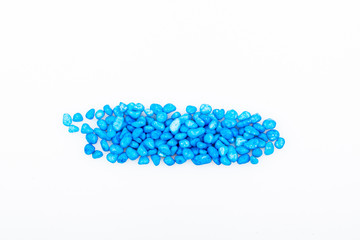 Blue pebbles stone with empty copyspace area for slogan or advertising text message, over isolated white background.