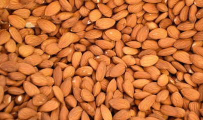 Almond nuts in a huge pile on a market stall in Istanbul