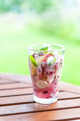 Vanilla and strawberry ice cream with fresh fruits