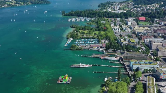 Aerial view of cityscape of Lucerne, lakeside part of city, crystal clear waters of lake Lucerne (Vierwaldstattersee) - landscape panorama of Switzerland from above, Europe