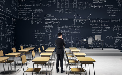 Businessman in modern classroom