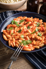 Cavatelli pasta with fresh tomato sauce.