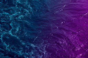 Abstract background sea wave surface with  filtered color on blue and purple, can using for...