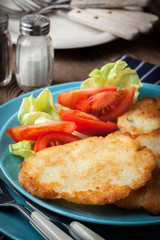 Crispy fried homemade potato pancakes.