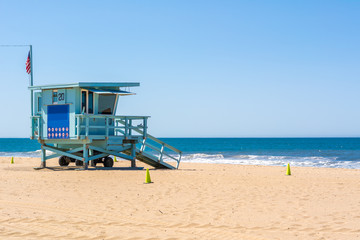 Fototapeta na wymiar Lifeguard tower at Santa Monica beach in California, USA