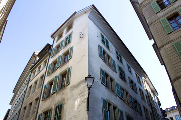 Fragment of a old building against the blue sky.Closeup.Geneva.Switzerland.