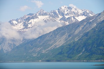 Fototapeta na wymiar Close up on snowy mountain in Alaska glacier bay national park and preserve. 