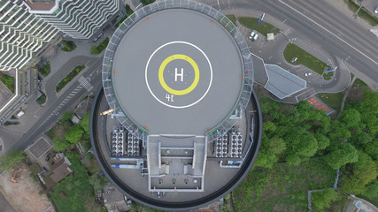 Super modern business center view from above, near the old village, a game of technology contrasts...