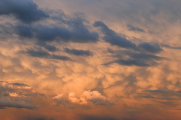dark blue clouds on pink from sunset sky