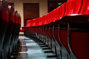 stacked chairs in the theatre, China