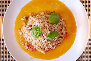 Whole grains with tomato, zucchini and capers. Ready to eat.Wiew from above