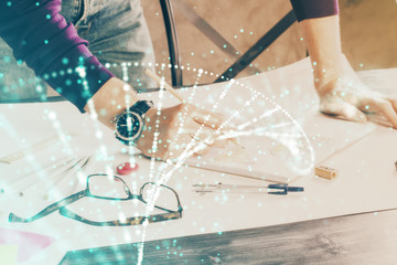 Man's hands working with notes background. Genetic engineering and gene manipulation concept.