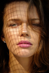 Fototapeta premium Closeup portrait of attractive young female