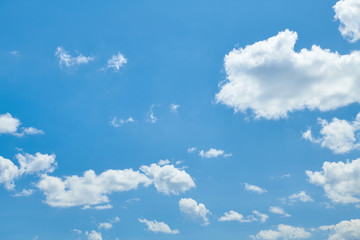 Bright beautiful blue sky with clouds for background or texture