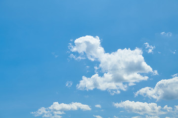 Bright beautiful blue sky with clouds for background or texture