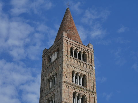 Pomposa Abbey is a Benedictine monastery built in Romanesque style on the Adriatic coast of Italy. It is famous for the Carolingian manuscripts by abbot Girolamo and because here the monk Guido d'Arez