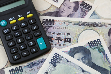 Calculator on Yen banknotes