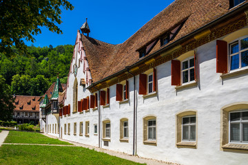 Fototapeta na wymiar Germany, Historic outer walls of german monastery called blaubeuren abbey in village next to popular tourist destination of blautopf source