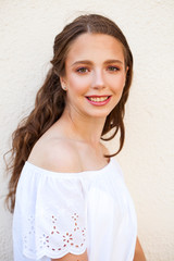 Portrait close up of young beautiful brunette woman