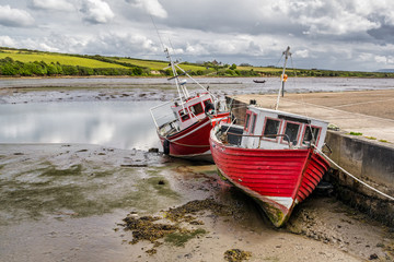 Fototapeta premium Fishing Boat at low tide