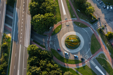 Cars on roundabout and intersecting roads © Marcel