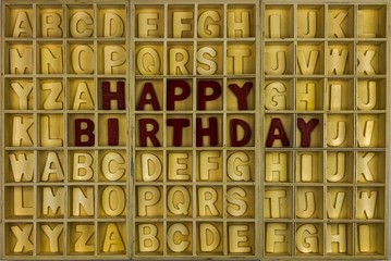 Happy Birthday wooden alphabet concept 