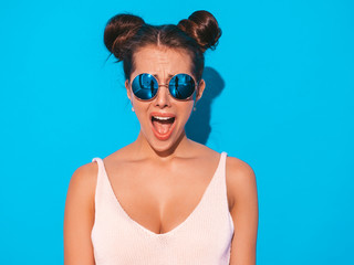 Closeup portrait of young beautiful sexy shocked hipster woman in sunglasses.Trendy Model isolated...