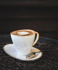Cup of latte on glass table. Latte Art. 