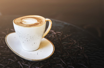 Cup of latte on glass table. Latte Art. 