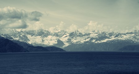 Fototapeta na wymiar View of Glacier in mountain valley in Glacier Bay National Park and Preserve