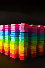 Rainbow stripes, steps with leaves, futurism abstraction on a black background