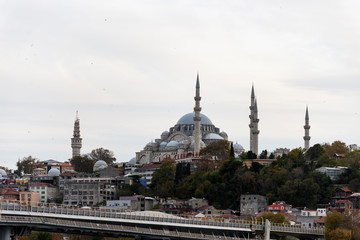 Fototapeta na wymiar Unkapani Metro bridge and Suleymaniye Mosque in Istanbul Eminonu Turkey.