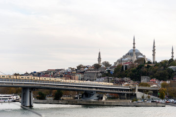 Unkapani Metro bridge and Suleymaniye Mosque in Istanbul Eminonu Turkey.