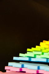 Rainbow stripes, steps with leaves, futurism abstraction on a black background