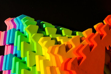 Rainbow stripes, steps with leaves, futurism abstraction on a black background