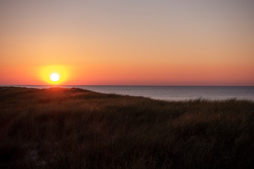 Czołpino morze bałtyckie bałtyk zachód słońca piasek plaża piach