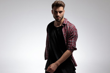 Confident casual guy romantically walking forward