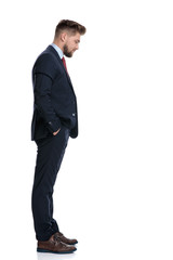 Side view of a confident businessman standing