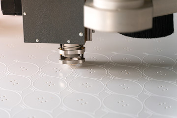CNC machine cutting with a controlled knife.
