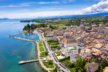 Aerial view of Morges city waterfront in the border of the Leman Lake in  Switzerland - obrazy, fototapety, plakaty